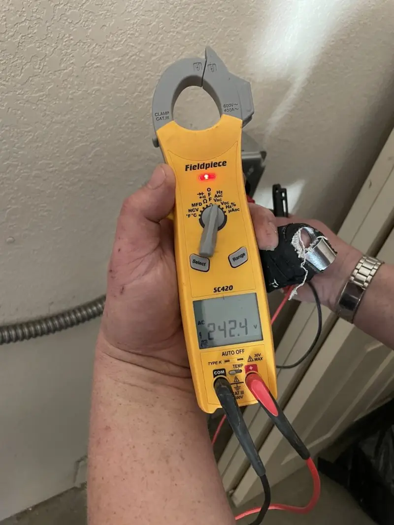 Voltage testing with clamp meter during Generator Installation in Greenacres